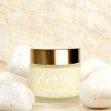 Creme SUperieure, ideal for moisturizing dry sensitive skin, with white stones and marble background