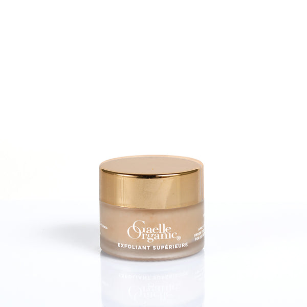 Exfolisnt Superieure travel-size, the best organic exfoliator for mature skin, on a plain background