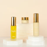 Affordable natural products for radiant skin - travel sizes, on white stones