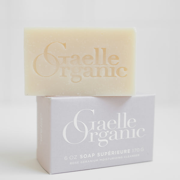 Gaelle Organic Soap Superieure, the best cleanser for mature skin, atop its outer box, on a white background