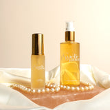 Full and travel-size Toner Superieure, a natural pore minimizer, on a pink stone with pearls