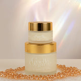 Full and travel size Ultra Sensitive Creme, the best moisturizer for dry sensitive skin, on a white surface with shiny gold beads