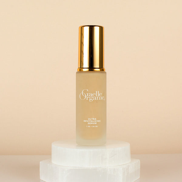 Ultra Revitalizing Serum, the best serum for lines and wrinkles, on white stone platform