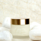 Ultra Sensitive Creme, an anti-aging moisturizer for sensitive skin, with white stones and a marble background